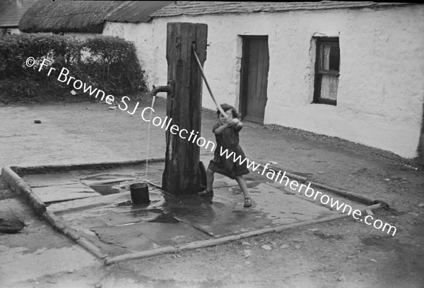 CHILD AT PUMP